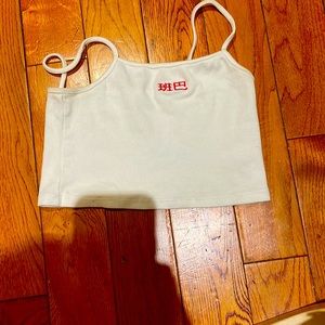 White crop with red lettering